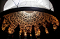 Visitors look at pictures of Jews killed in the Holocaust in the Hall of Names in the Yad Vashem Holocaust Memorial in Jerusalem, Sunday, April 7, 2013. The annual Israeli memorial day for the 6 million Jews killed in the Holocaust of World War II begins 