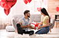 bigstock-Lovely-Young-Couple-With-Gift-333634909