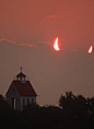 The Devil’s Eclipse right above a church ​​​​