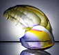 Gorgeous Glass Vessels by Graham Muir : Scottish glass artist Graham Muir creates beautiful pieces that look like waves frozen in time.

"I find glass to be a material that does not respond well to being dominated by the artist. For me the concept of