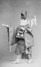 Shinto Priest in Costume, Carrying Hondawara Branch with Strips of Paper Representing Offerings. About 1880’s, Japan, by Ogawa, Isshin. Smithsonian Institution, Freer Gallery of Art and Arthur M. Sackler Gallery Archives: 