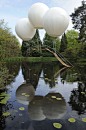 This could be a good idea for a entrance to a tree house (except with something more like hot air balloons so you could inflate when you wanted to get in) - - - Pont de Singe bridge by Olivier Grossetête.
