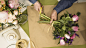 male-florist-pruning-stem-flowers-bouquet-flower-shop