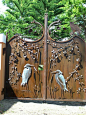 Egret two-panel, solid wrought iron privacy gate... aahhhh!