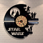 Wall clock made of a single vinyl record. The size is 12 inches (30 cm). It will fit any wall with its exclusivity and unique look. The clock has a: 