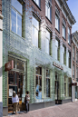 MVRDV’s Crystal Houses, Hosting New Tenant Hermès, Re-Opens with an Even More Transparent Facade : Transparent glass bricks dissolve into traditional terracotta bricks
