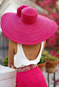 A striking hat in hot pink!