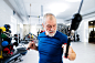 Fit senior man in gym working out with weights. by Jozef Polc on 500px