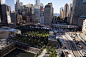 Friends and relatives of the victims of the Sept. 11 terrorist attacks on the World Trade Center attend a ceremony marking the 11th anniversary of the attacks at the National September 11 Memorial at the World Trade Center site in New York, Tuesday, Sept.