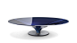 OVNI cocktail table ø.122| Roche Bobois : The OVNI cocktail table is a dynamic design by Vincenzo Maiolino that features a unique hollow cone finished with thin circular stripes. The shape extends harmoniously down the base, which is balanced on a lacquer