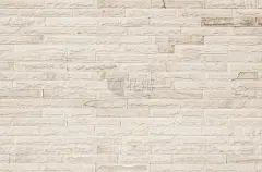 空背景宽奶油色砖墙纹理。旧褐色砖墙混凝土或石材图案自然，壁纸石灰石抽象地板/网格凹凸不平的内部岩石。