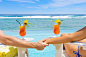 Caucasian couple relaxing in adirondack chairs near swimming pool by Gable Denims on 500px