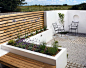 A very clean cut, contemporary courtyard garden requiring minimal maintenance but maximum chic from its owners!