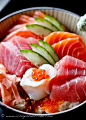 Salmon & Tuna Chirashi - The word "chirashi" means "scattered," so this is basically a big bowl of rice mixed with fish, vegetables, and additional ingredients of your choice. It's a delicious one-bowl meal that is very filling and