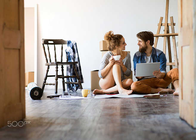 Young couple moving ...