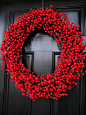 Crown your front door with berries, foliage, pinecones and other decorative touches that convey a warm fall welcome