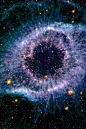 The Helix Nebula, lies 650 light-years away, in the constellation of Aquarius. It is a typical example of a class of objects called planetary nebula. Planetary nebulae are actually the remains of stars that once looked a lot like our sun. These stars spen
