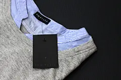 Tom Fella : Tom Fella is a fashion brand located in San Pedro Garza García, Mexico. It's approach is a timeless minimal design representing feminine &amp; masculine taste blended in a women's fashion brand. The icon represents a man's bowtie along with a 