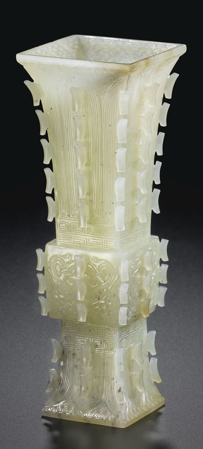 A WHITE JADE VASE, F...