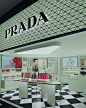 Photo by Prada Beauty on April 19, 2024. May be an image of 1 person, fragrance, perfume, display case and text.