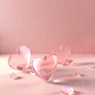 Light pink background, clean background, heart-shaped crystal transparent body, crystal body with angles, crystal is smooth, two ribbons on the ground, product rendering , 3D ar 16:9