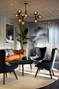 Really love how they created the illusion of panelling on the glass wall. Escala Partners: 