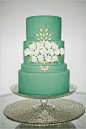 This green and gold wedding cake is just beautiful! Anne Kathleen Cakes