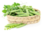 Fresh green peas in basket on a white