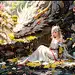 72100987-1906702412-1girl,dress,long hair,white dress,flower,barefoot,sitting,dragon,pointy ears,white hair,outdoors,horns,white flower,nature,lette