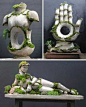 Robert Cannon’s living sculptures are full of life and movement thanks to the pieces of living moss he strategically places on the forms. The moss grows and changes while the stone stays as rigid and unmoving as always. The difference between the two mate