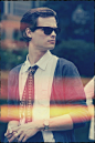 only reid can make black ray bans look good with that tie.