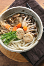 Three Mushrooms Udon for Fall

shimeji mushrooms, maitake mushrooms, enoki mushrooms, mini ganmodoki
(cooked all with soysauce, sake, mirin and sugar)
boiled carrot, long green onion,
Soup: shiro-dashi and mirin