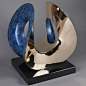 #Cast #bronze #sculpture by #sculptor Thomas Joynes titled: 'Orchid (Bronze Symmetric Contemporary Indoor statue)'. #ThomasJoynes