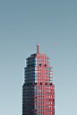 aerial photography of red and glass building