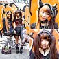 Ringo (17) and Kurousagi (16) on the street in Harajuku with cute twin tails hairstyles and fashion from Sex Pot Revenge, Hellcatpunks, Bloody Mary, Yosuke, Vivienne Westwood & h.NAOTO. They are both fans of rock/visual kei music.