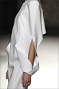 Minimal Fashion - white dress with structured silhouette, drape and sleeve fold details: 