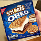 someone holding up a bag of smores oreo
