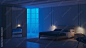 Modern bedroom interior with blue walls. Night. Evening lighting. 3D rendering.