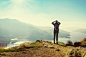 andreaobzerova在 500px 上的照片Female hiker on top of the mountain enjoying valley view, Ben A&#x;27an, Loch Katrina, Highlands, Scotlan