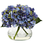 One of our favorites - beautiful blue violet hydrangea. This petite silk faux floral arrangement is just the right size for your decorating needs. Expertly crafted soft full blooms in an attractive co