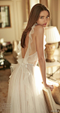 eisen stein fall 2020 bridal sleeveless halter neck heavily embellished sheer bodice tulle skirt romantic soft a  line wedding dress backless medium train (7) bv