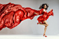 Jaroslav Monchak在 500px 上的照片Woman in red waving dress with flying fabric