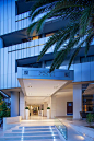 Galaxy entrance - lit 'hanging' canopy with Linear language signs - www.galaxy-hotel.com