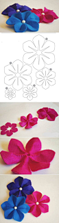 DIY Easy Felt Flower...Cutting is the hardest part to making this pretty little flower...A small decorative button also looks nice in the center.: 