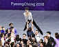 Yuzuru Hanyu of Japan smiles as another performer holds him aloft during the figure skating exhibition gala at the Pyeongchang Winter Olympics in...