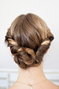 This twist-y updo is perfect for summer days or nights. #hairstyle #beauty