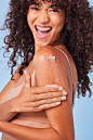 Woman using Raw Sugar Sugar Scrub on her arm