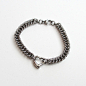 Stainless steel chainmail bracelet with 3D heart : Stainless steel bracelets are meant to last a lifetime. This stunning chainmail bracelet was handwoven using saw cut stainless steel jump