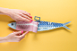 Paper Sardine : Paper Sardine, layered paper sculpture created for the 2016 Festas de Lisboa annual contest. A paper illustration of a fun sardine being opened like a can. 