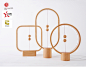 Heng : HENG is a serious of lamps breaking the traditional way to turn on lamps. The two balls in the wooden frames serve as switches of the lamps. As we raise the the lower ball, the two balls would be drawn together magnetically. They would float in the